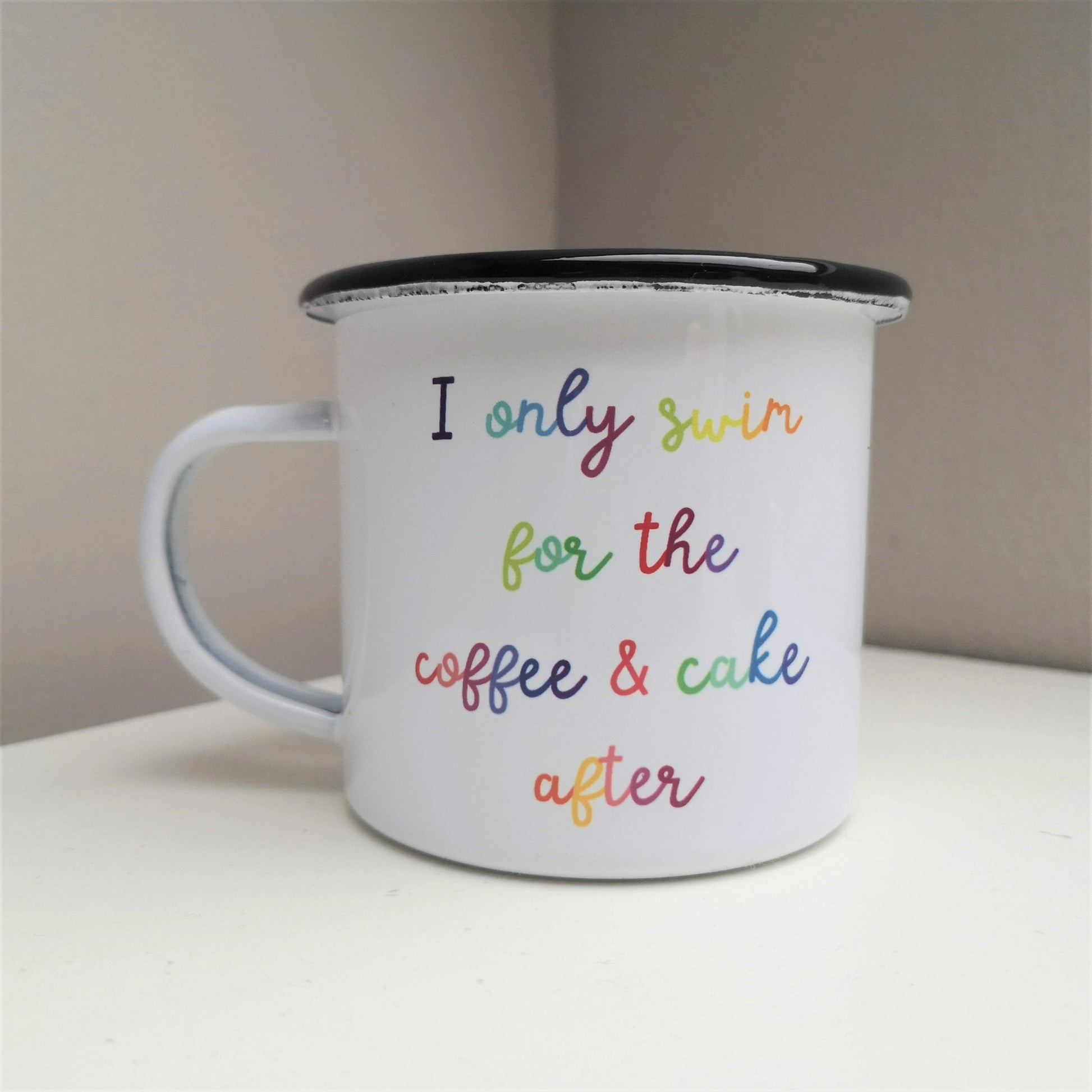 A steel enamel cup for your after-swim tipples, with a choice of 3 confessions in colourful rainbow text.  This mug has the following excuse - I only swim for the coffee & cake after.  