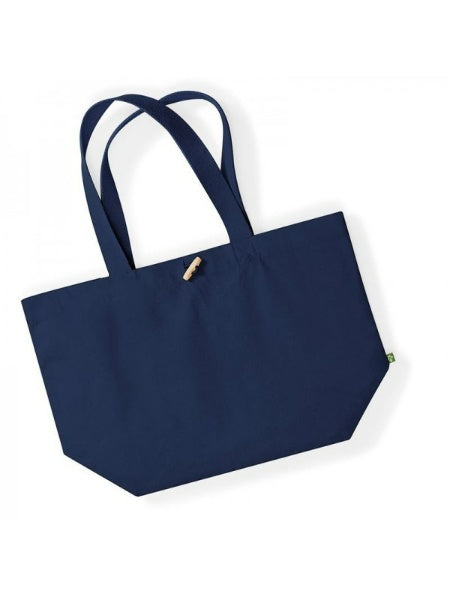 A photo showing the shape of the navy organic cotton tote